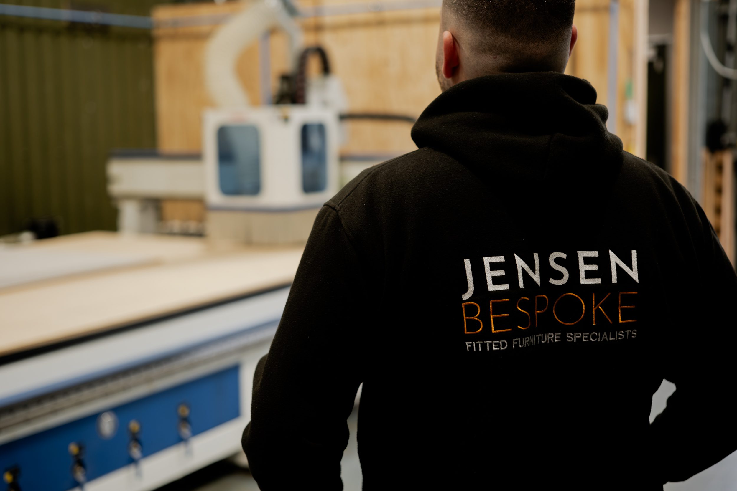 Jensen Bespoke team member working in warehouse