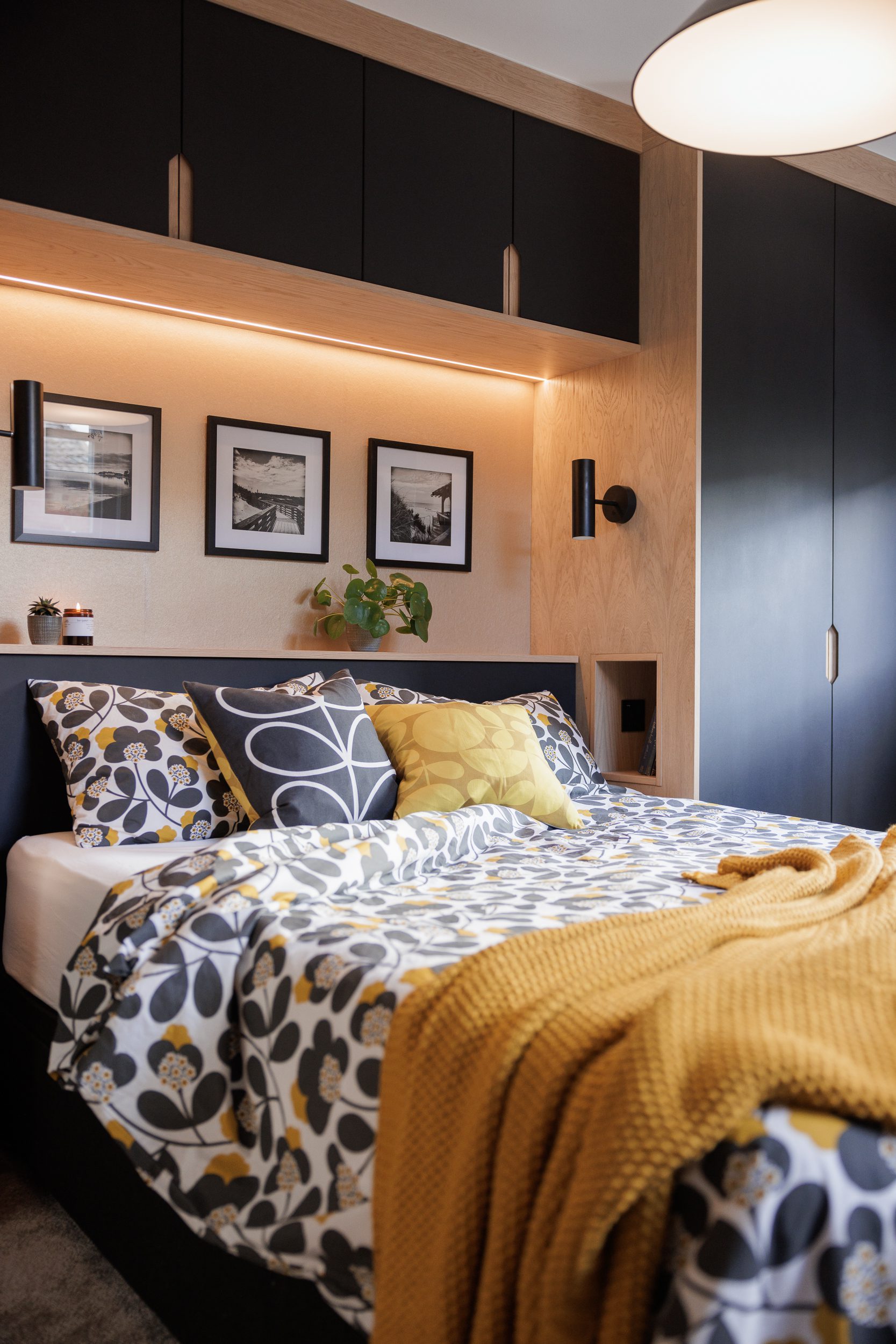 Bright and airy bedroom with hand crafted wardrobes
