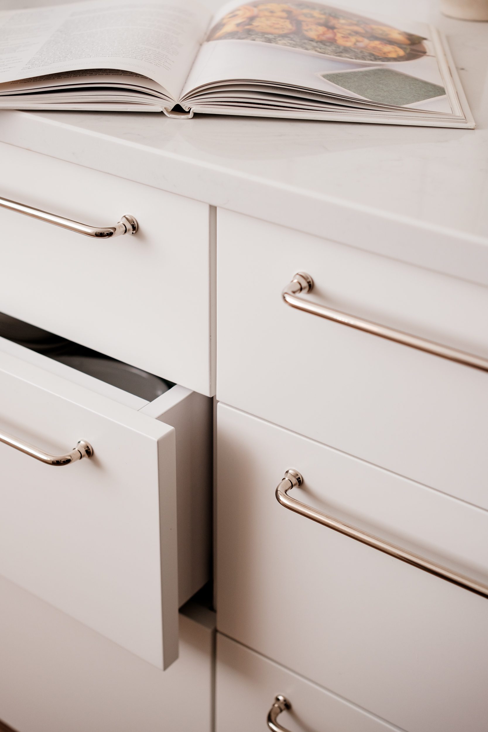 White cabinets with silver handles