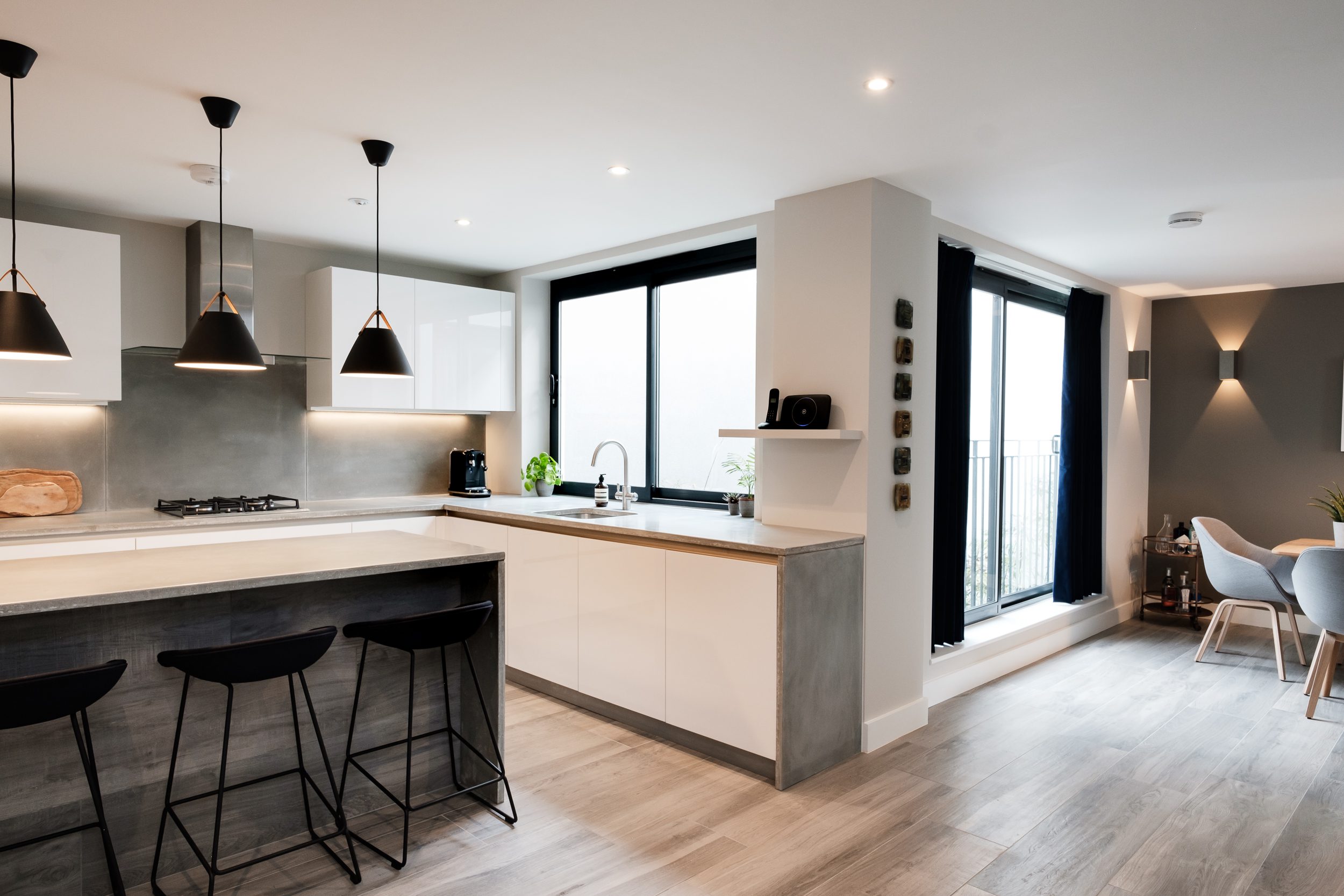 Bright white kitchen with island worktop