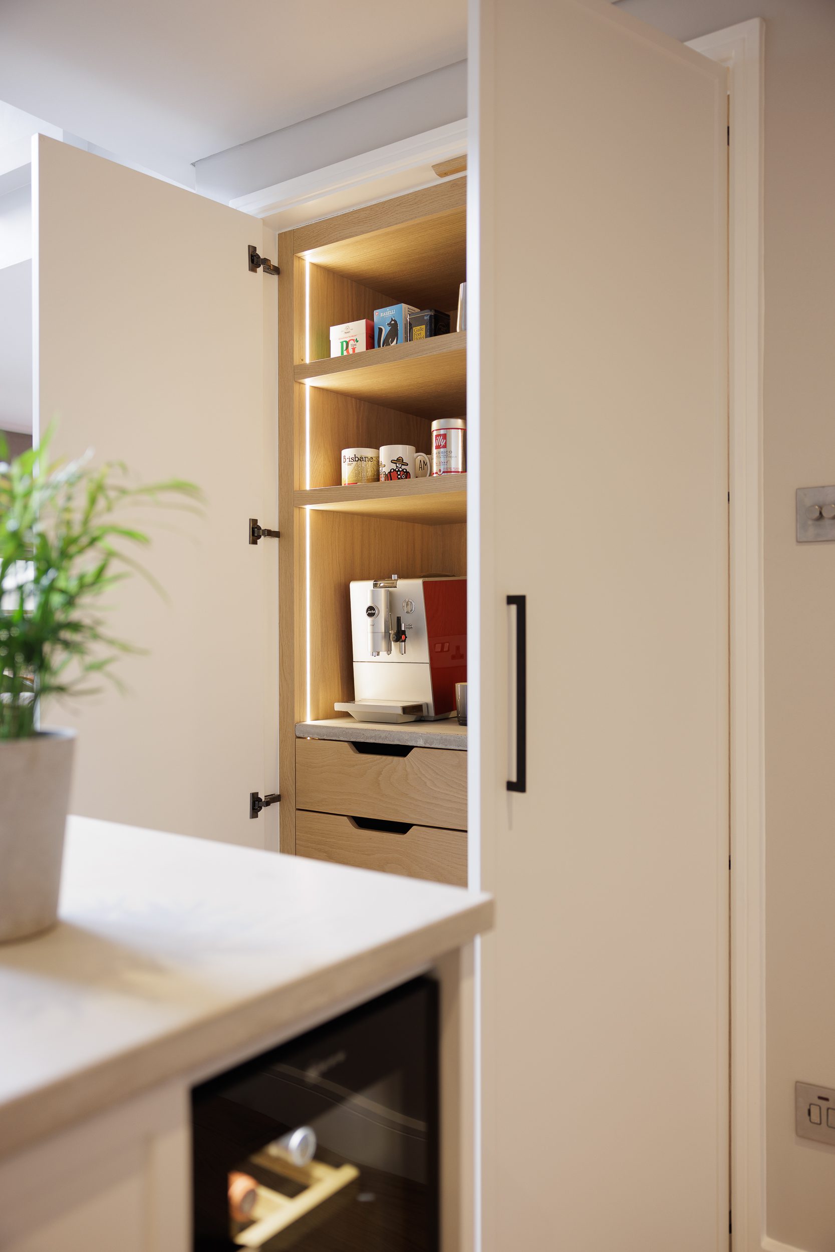 White cabinets with black handles